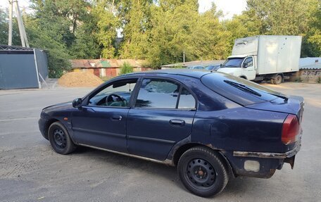 Mitsubishi Carisma I, 1998 год, 100 000 рублей, 4 фотография