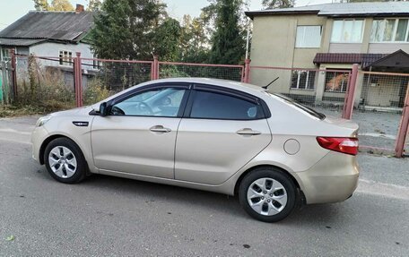 KIA Rio III рестайлинг, 2013 год, 930 000 рублей, 21 фотография