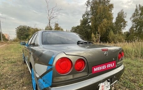 Nissan Skyline, 1999 год, 790 000 рублей, 10 фотография