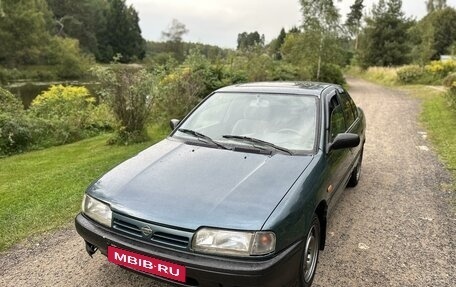 Nissan Primera II рестайлинг, 1993 год, 150 000 рублей, 3 фотография