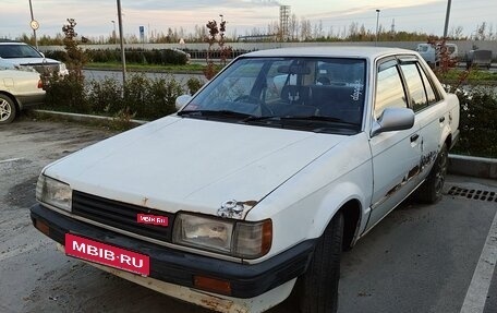 Mazda Familia, 1988 год, 95 000 рублей, 1 фотография