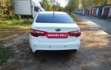 KIA Rio III рестайлинг, 2013 год, 890 000 рублей, 7 фотография