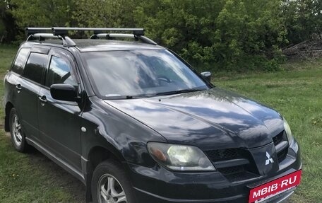 Mitsubishi Outlander III рестайлинг 3, 2004 год, 650 000 рублей, 7 фотография