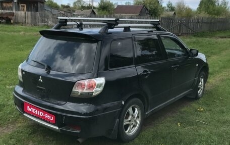 Mitsubishi Outlander III рестайлинг 3, 2004 год, 650 000 рублей, 8 фотография