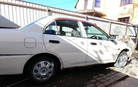 Mitsubishi Mirage VI рестайлинг, 1997 год, 160 000 рублей, 26 фотография