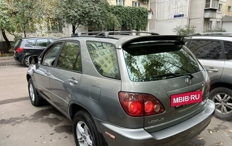 Lexus RX IV рестайлинг, 2000 год, 895 000 рублей, 2 фотография