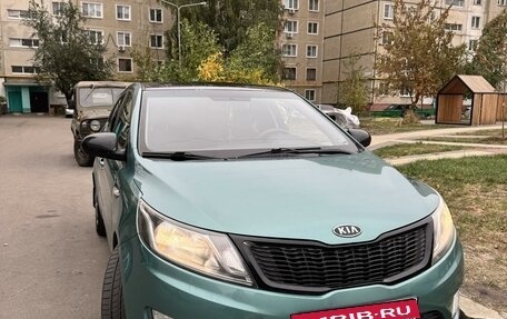 KIA Rio III рестайлинг, 2012 год, 720 000 рублей, 2 фотография