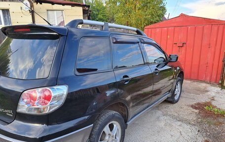 Mitsubishi Outlander III рестайлинг 3, 2004 год, 950 000 рублей, 4 фотография