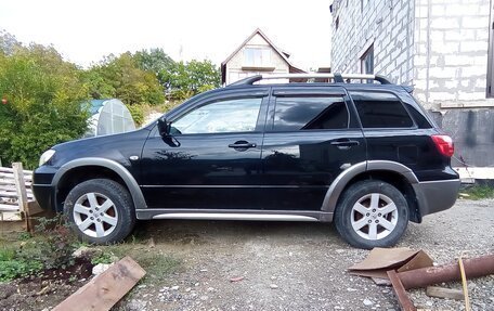 Mitsubishi Outlander III рестайлинг 3, 2006 год, 695 000 рублей, 3 фотография