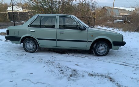 Nissan Sunny B11, 1985 год, 350 000 рублей, 38 фотография