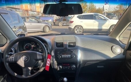 Suzuki SX4 II рестайлинг, 2010 год, 750 000 рублей, 19 фотография