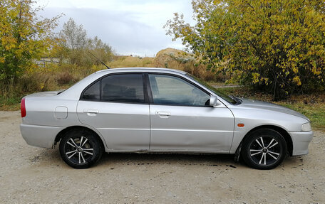 Mitsubishi Lancer VII, 1997 год, 235 000 рублей, 3 фотография