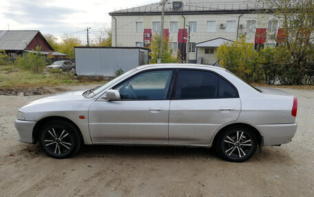 Mitsubishi Lancer VII, 1997 год, 235 000 рублей, 4 фотография