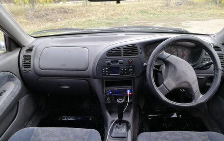 Mitsubishi Lancer VII, 1997 год, 235 000 рублей, 9 фотография