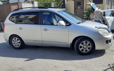 KIA Carens III (RP), 2009 год, 900 000 рублей, 1 фотография