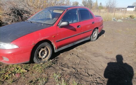 Mitsubishi Carisma I, 1997 год, 125 000 рублей, 1 фотография