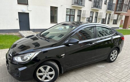 Hyundai Solaris II рестайлинг, 2011 год, 695 000 рублей, 2 фотография