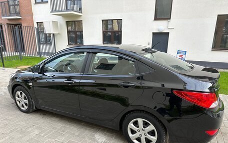 Hyundai Solaris II рестайлинг, 2011 год, 695 000 рублей, 3 фотография