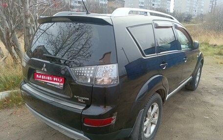 Mitsubishi Outlander III рестайлинг 3, 2007 год, 1 050 000 рублей, 3 фотография