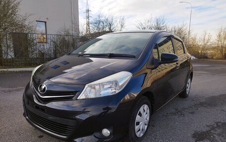 Toyota Vitz, 2011 год, 855 000 рублей, 2 фотография