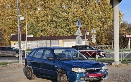 Mazda 323, 1998 год, 149 000 рублей, 8 фотография