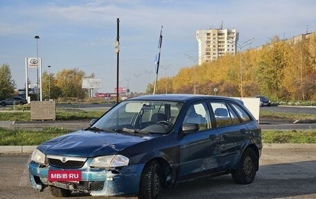 Mazda 323, 1998 год, 149 000 рублей, 9 фотография