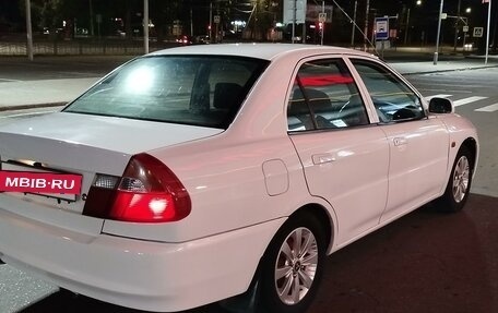 Mitsubishi Lancer VII, 1997 год, 310 000 рублей, 3 фотография