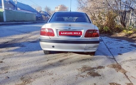 Mitsubishi Carisma I, 2003 год, 127 000 рублей, 25 фотография