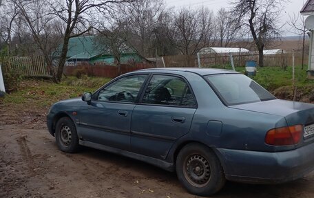 Mitsubishi Carisma I, 1998 год, 260 000 рублей, 10 фотография