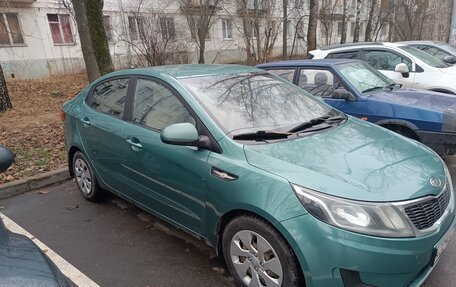 KIA Rio III рестайлинг, 2011 год, 650 000 рублей, 4 фотография