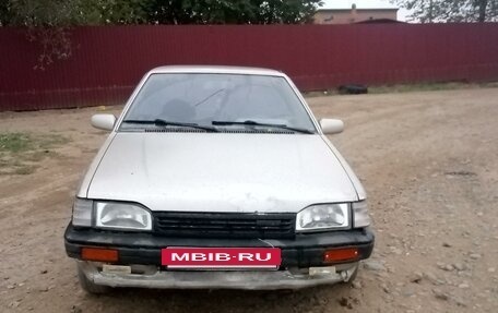 Mazda 323, 1988 год, 100 000 рублей, 4 фотография