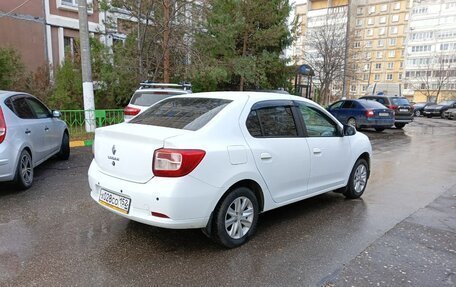 Renault Logan II, 2020 год, 900 000 рублей, 11 фотография