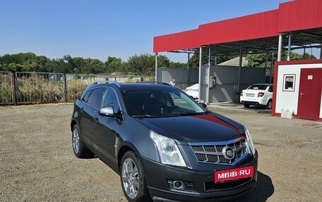 Cadillac SRX II рестайлинг, 2010 год, 1 650 000 рублей, 15 фотография