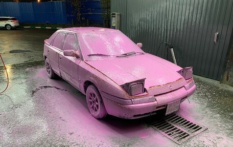 Mazda 323, 1992 год, 165 000 рублей, 10 фотография