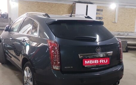 Cadillac SRX II рестайлинг, 2011 год, 400 000 рублей, 4 фотография