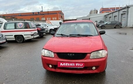 Mazda 323, 1998 год, 150 000 рублей, 5 фотография