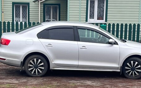 Volkswagen Jetta VI, 2013 год, 915 000 рублей, 1 фотография