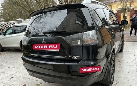 Mitsubishi Outlander III рестайлинг 3, 2010 год, 990 990 рублей, 6 фотография