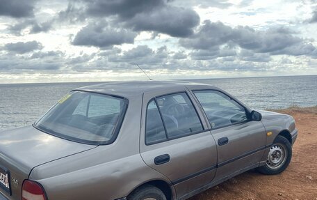 Nissan Sunny N14, 1992 год, 300 000 рублей, 4 фотография