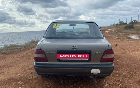 Nissan Sunny N14, 1992 год, 300 000 рублей, 3 фотография