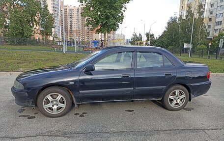 Mitsubishi Carisma I, 2003 год, 350 000 рублей, 12 фотография