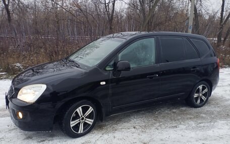 KIA Carens III (RP), 2011 год, 799 000 рублей, 7 фотография