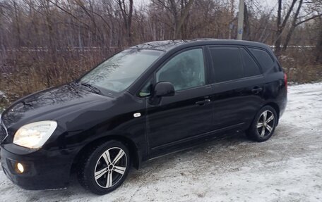 KIA Carens III (RP), 2011 год, 799 000 рублей, 13 фотография