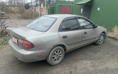 Mazda 323, 1998 год, 120 000 рублей, 5 фотография