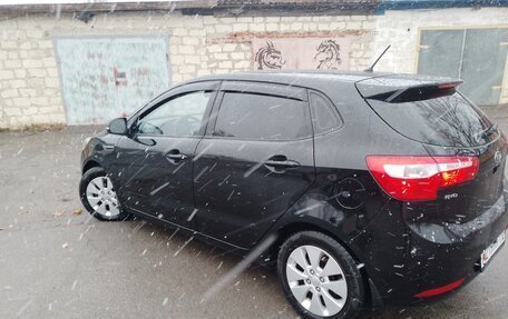 KIA Rio III рестайлинг, 2012 год, 995 000 рублей, 19 фотография