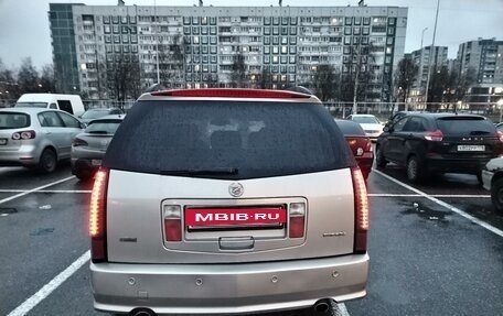 Cadillac SRX II рестайлинг, 2007 год, 550 000 рублей, 3 фотография