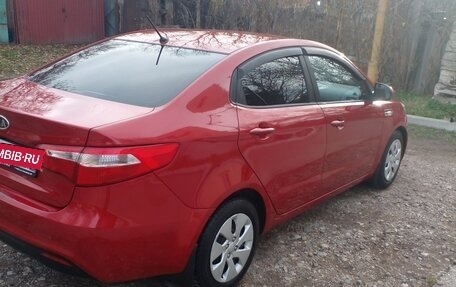 KIA Rio III рестайлинг, 2012 год, 850 000 рублей, 18 фотография