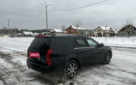 Cadillac SRX II рестайлинг, 2009 год, 599 000 рублей, 3 фотография