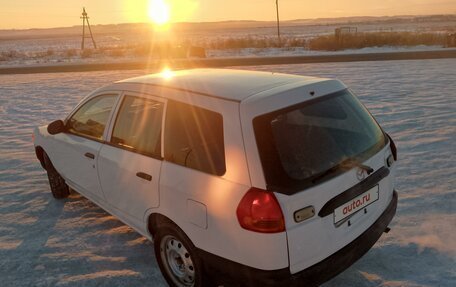 Mazda Familia Y11, 2002 год, 340 000 рублей, 12 фотография