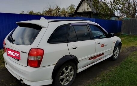 Mazda Familia, 2000 год, 300 000 рублей, 9 фотография